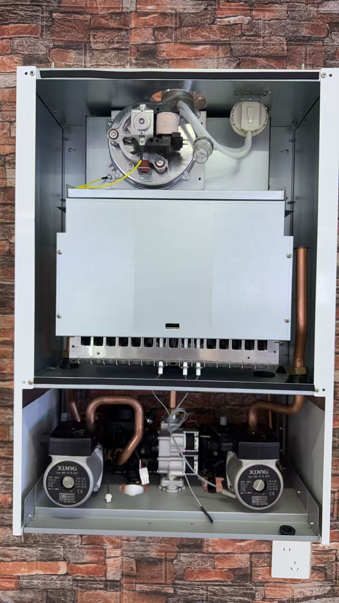 What are the advantages and disadvantages of heating with a gas wall-hung boiler?